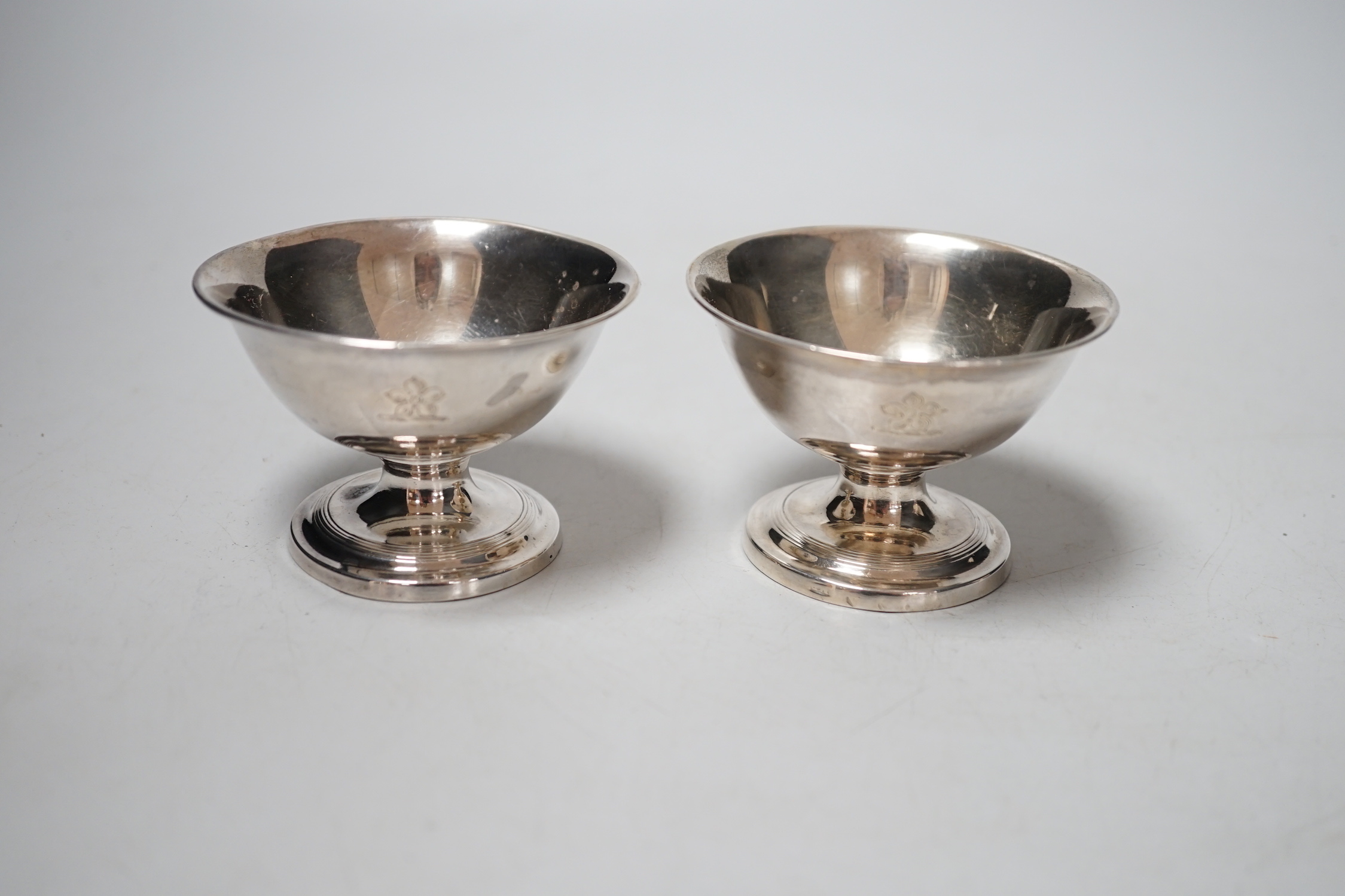 A pair of Matthew Boulton silver pedestal salt cellars, marks rubbed, height 5cm.